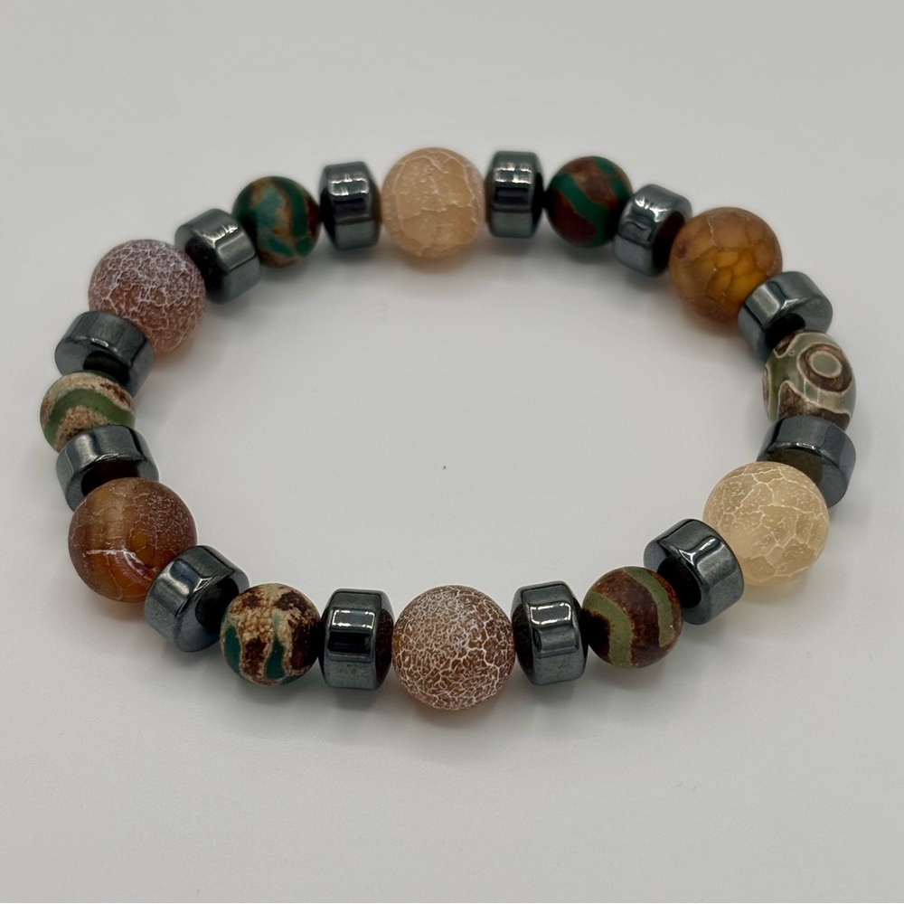 Brown and Black Beaded Jewelry Bracelet with Earthy Tones and Unique Textures